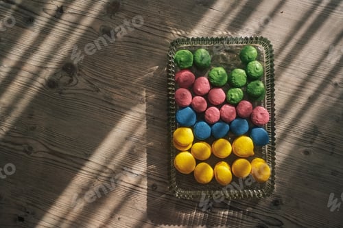 Preview: woman artisan baking macarons at home