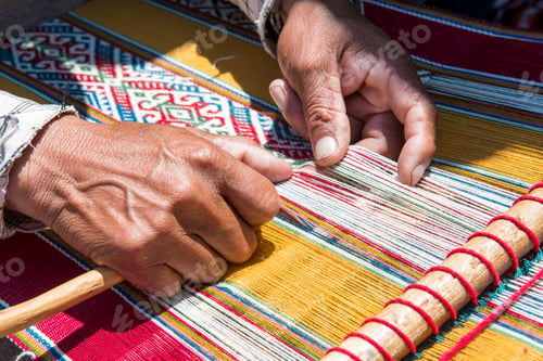 Preview: Closeup shot of an aged female sewing a beautiful embroidery product