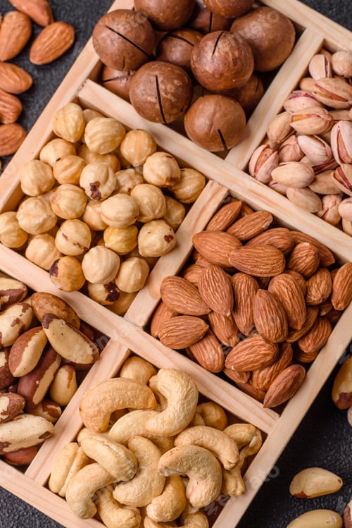 Preview: A mix of cashews, pistachios, almonds, macadamia and hazelnuts. Nuts as a food background