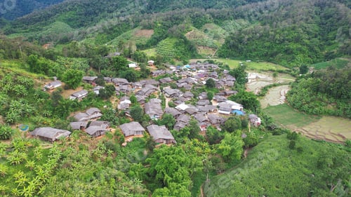 Preview: Aerial view from drone of the rural village and rice terraces in the mountains