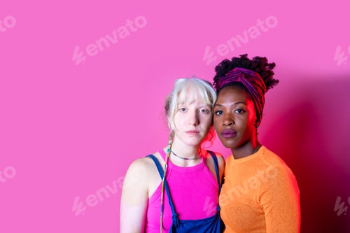 Preview: Isolated caucasian and black woman posing together for inclusion and tolerance