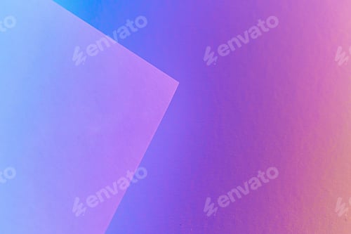 Preview: Blank paper sheets rolled in a neon purple lighting