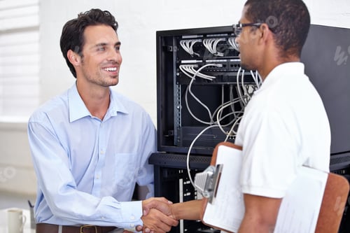 Preview: Caring for his IT needs. A young IT specialist ready to fix a server.