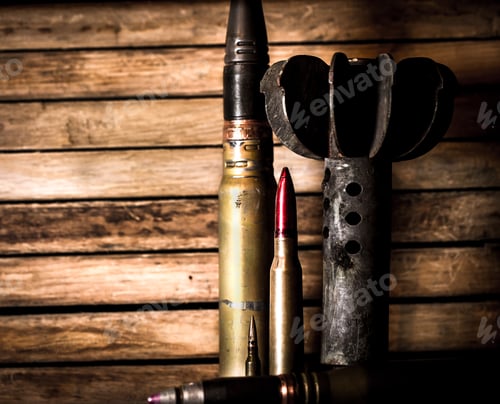 Preview: weapons, cartridge on wooden background