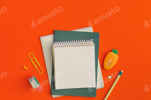 Preview: School stationery on red background. Top view with copy space. Flat lay. Back to school concept.