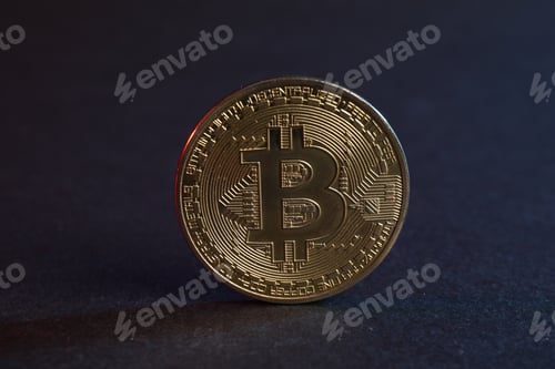 Preview: Cryptocurrency. Bitcoin on blue background, closeup view