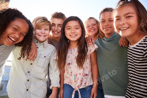 Preview: School kids hanging out during break, smiling to camera