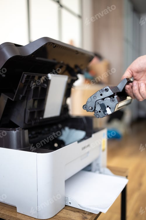 Preview: hands repairing laser toner cartridge