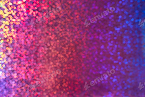 Preview: A rainbow sparkle background with colourful bokeh