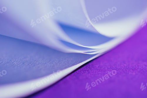 Preview: close up view of white paper on purple surface