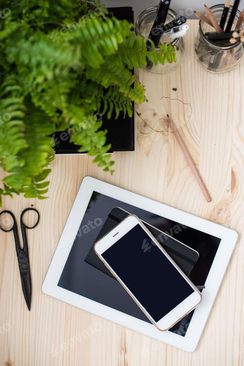 Preview: Tablet And Smartphone On Office Table