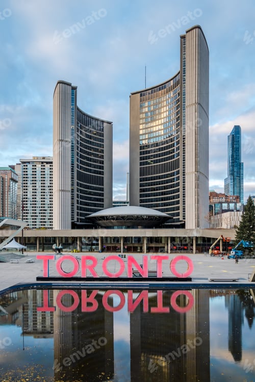 Preview: Toronto sign and the New City Hall on Nathan Phillips Square - Toronto, Ontario, Canada