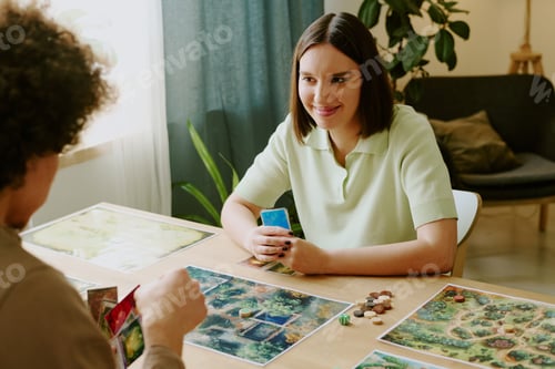 Preview: Man And Woman Playing Board Game