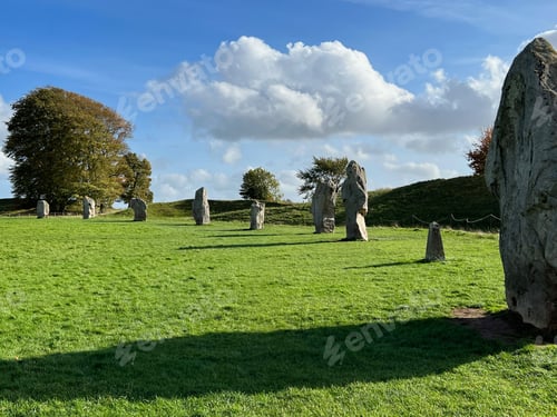 Preview: Grassy field surrounded by a large stones