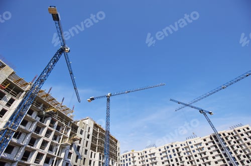 Preview: Construction site with cranes on sky background