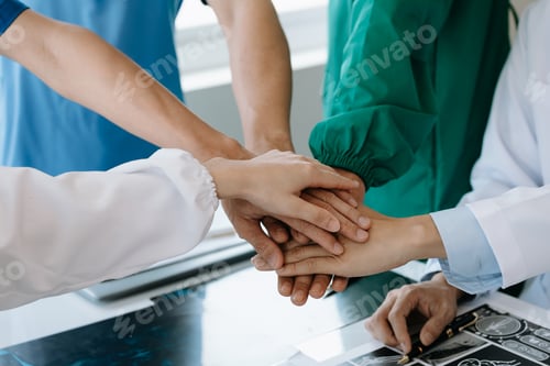 Preview: Team Doctors nurses union coordinate hands Teamwork Concept in hospital for success and trust in the