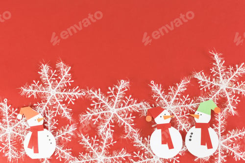Preview: Closeup shot of a Christmas decoration on dark red board with your text space