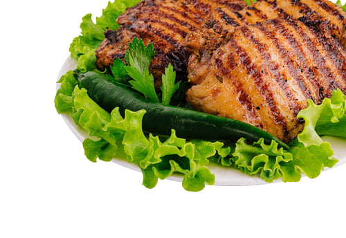 Preview: Grilled Chicken Thighs on a Plate with Greens