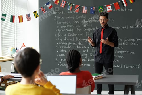 Preview: Teacher explaining material in the classroom