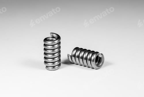 Preview: a couple of metal springs sitting on top of each other
