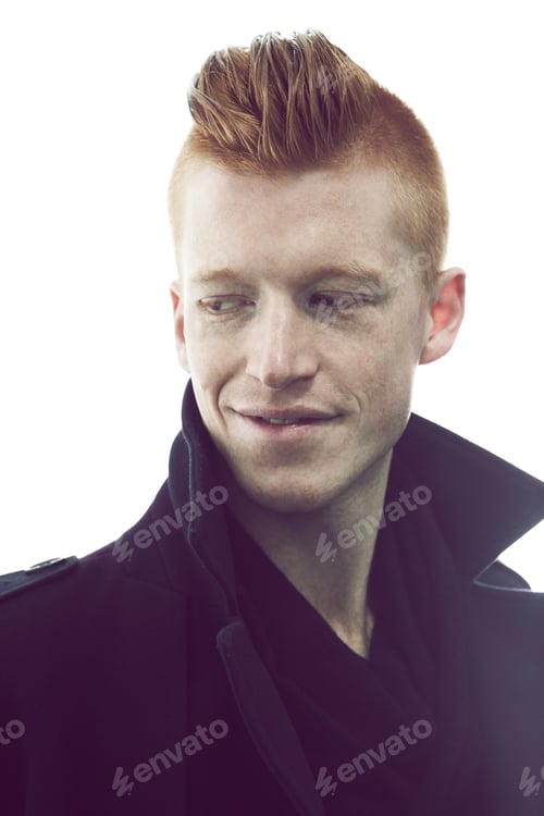 Preview: Casual style. A young redheaded man posing in a black jacket.