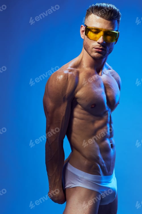 Preview: guy in white shorts and glasses on an isolated blue background