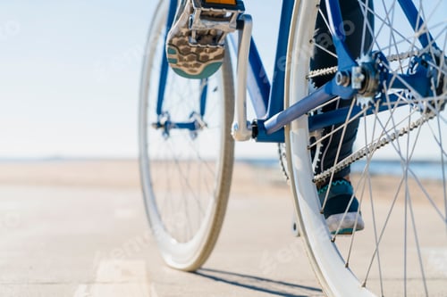 Preview: Woman cycling, low section, close-up