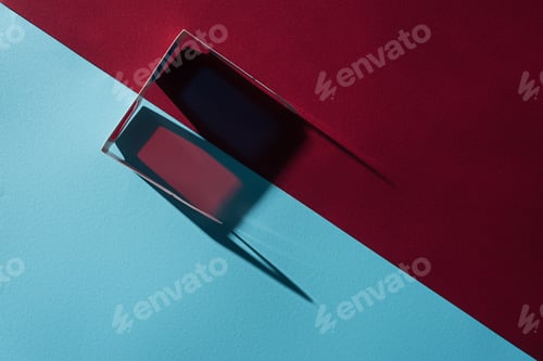 Preview: top view of 3d glasses with long shadow on blue and bordo background