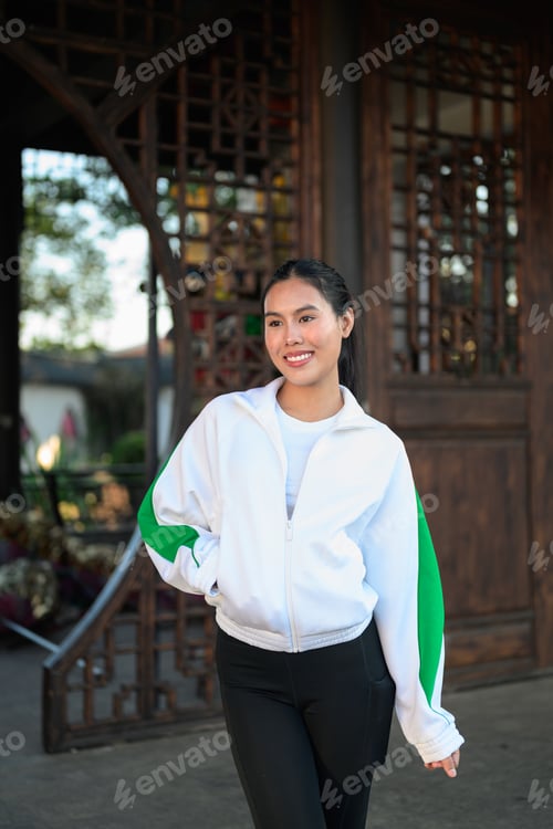 Preview: Young Asian Woman in Sporty Casual Outfit Outdoors