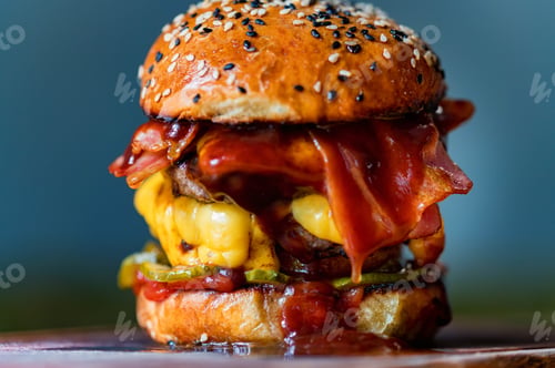 Preview: Close up tasty burger with minced meat served on tray