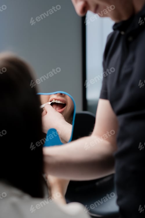 Preview: Dentistry doctor's consultation about teeth whitening color selection