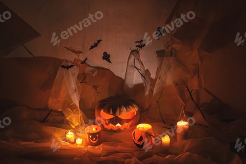 Preview: Spooky Jack o lantern carved pumpkin, spider web, ghost, bats and glowing light