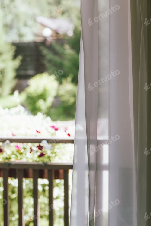 Preview: White curtain on the window overlooking the backyard