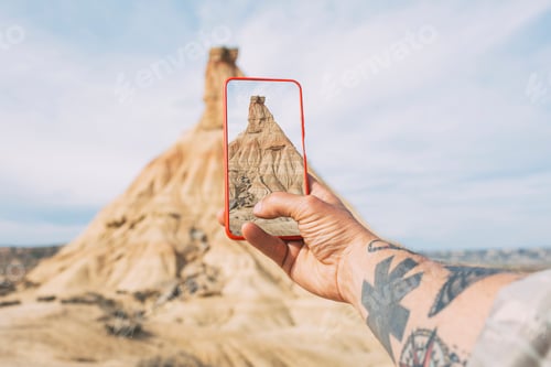 Preview: Taking photos with a smartphone of a Castil de Tierra peak, close-up shot