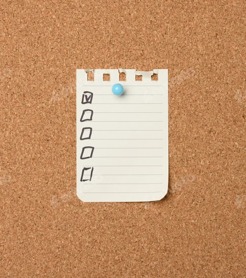 Preview: Blank sheet of paper in a line attached with a plastic button on a brown cork board