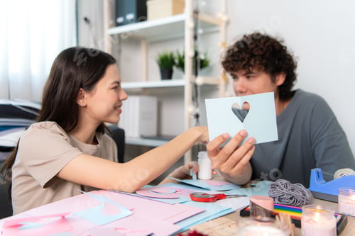Preview: A young couple with Valentine's Day activities at home
