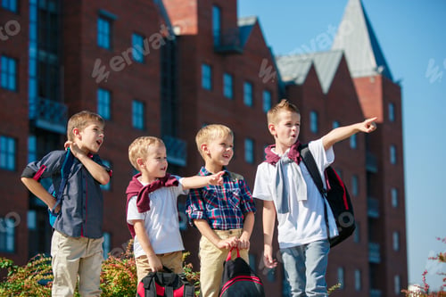 Preview: A group of children of school and preschool age are standing against sity