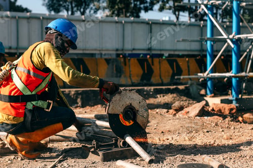 Preview: Construction worker using iron grinder