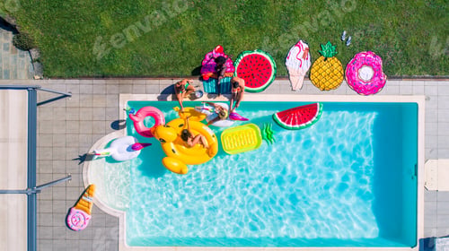 Preview: Friends having fun in a swimming pool