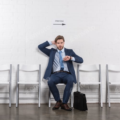 Preview: pensive caucasian businessman waiting for job interview