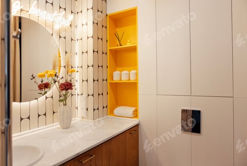 Preview: Modern stylish bathroom interior. A marble countertop with a sink and a vase