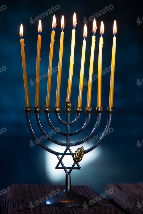 Preview: candles burning in menorah for Hannukah
