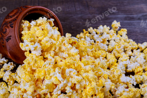 Preview: Salt popcorn on the wooden background . With space for text Popcorn homemade in Brown
