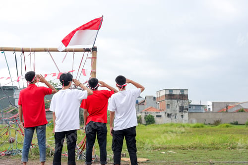 Preview: Teenagers Honoring Flag in Outdoor Setting