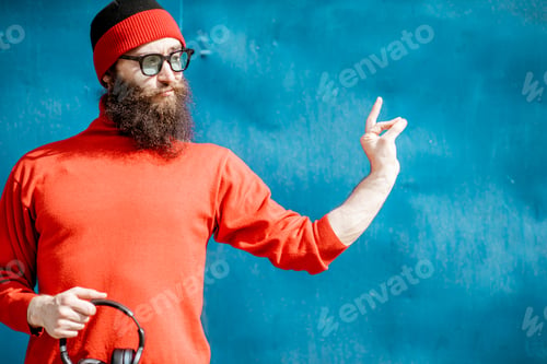 Preview: Portrait of a stylish man on the colorful background