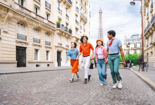 Preview: Group of young happy friends visiting Paris and Eiffel Tower