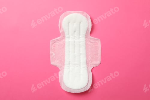 Preview: Sanitary pad on pink background, top view