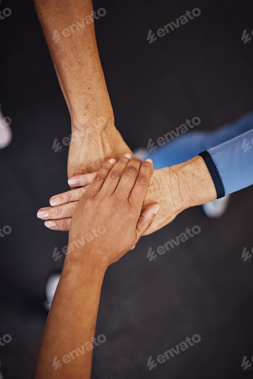 Preview: Teamwork, top view and senior women hands together for team building, motivation and unity. Support