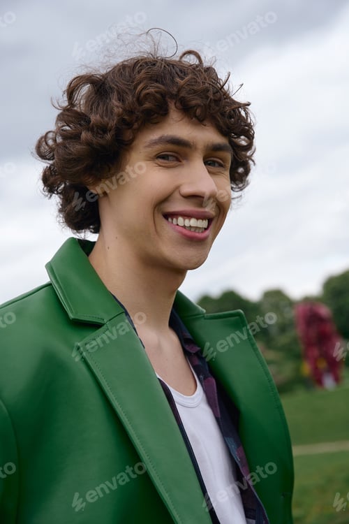 Preview: Young student enjoys a refreshing walk through a vibrant outdoor landscape on a cloudy day