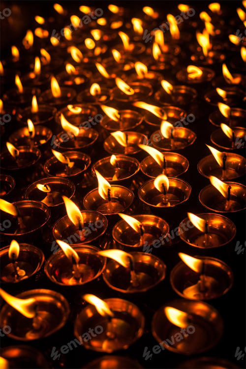 Preview: Burning candles in Tibetan Buddhist temple